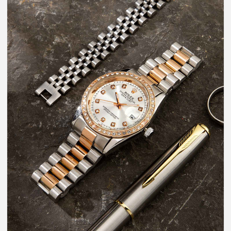 ساعت مچی مردانه وزنانه رولکس اصلی قفل رولکسی قاب نگین دار رنگ ثابت ضداب کیفیت بینظیرROLEX