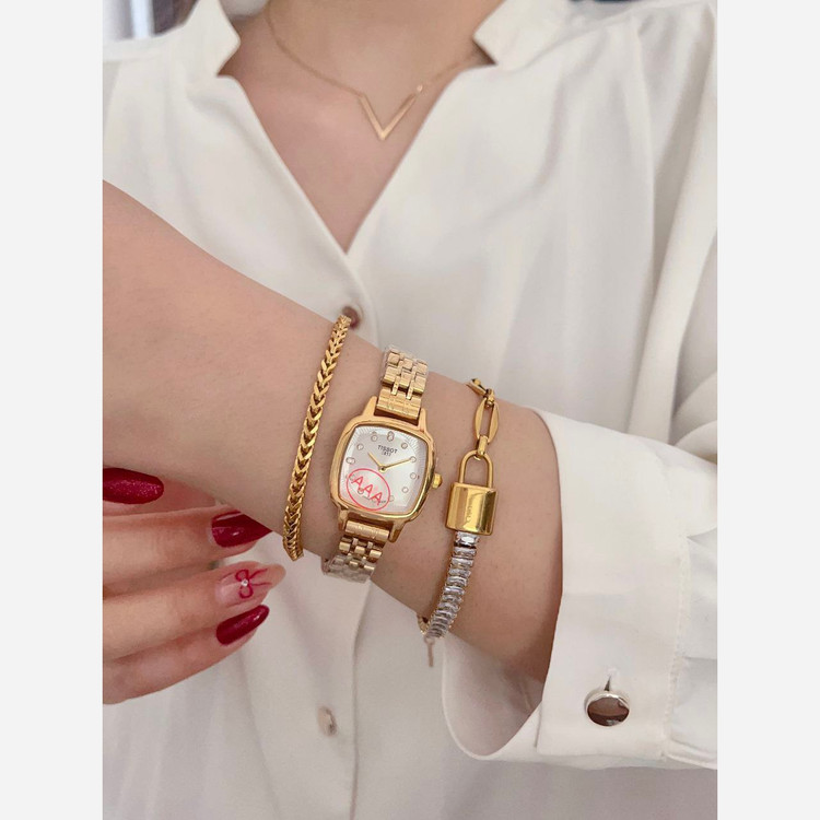 ساعت مچی زنانه تیسوتTISSOT بنداستیل طلایی صفحه مربع سبز ضدآب خاص وجذاب