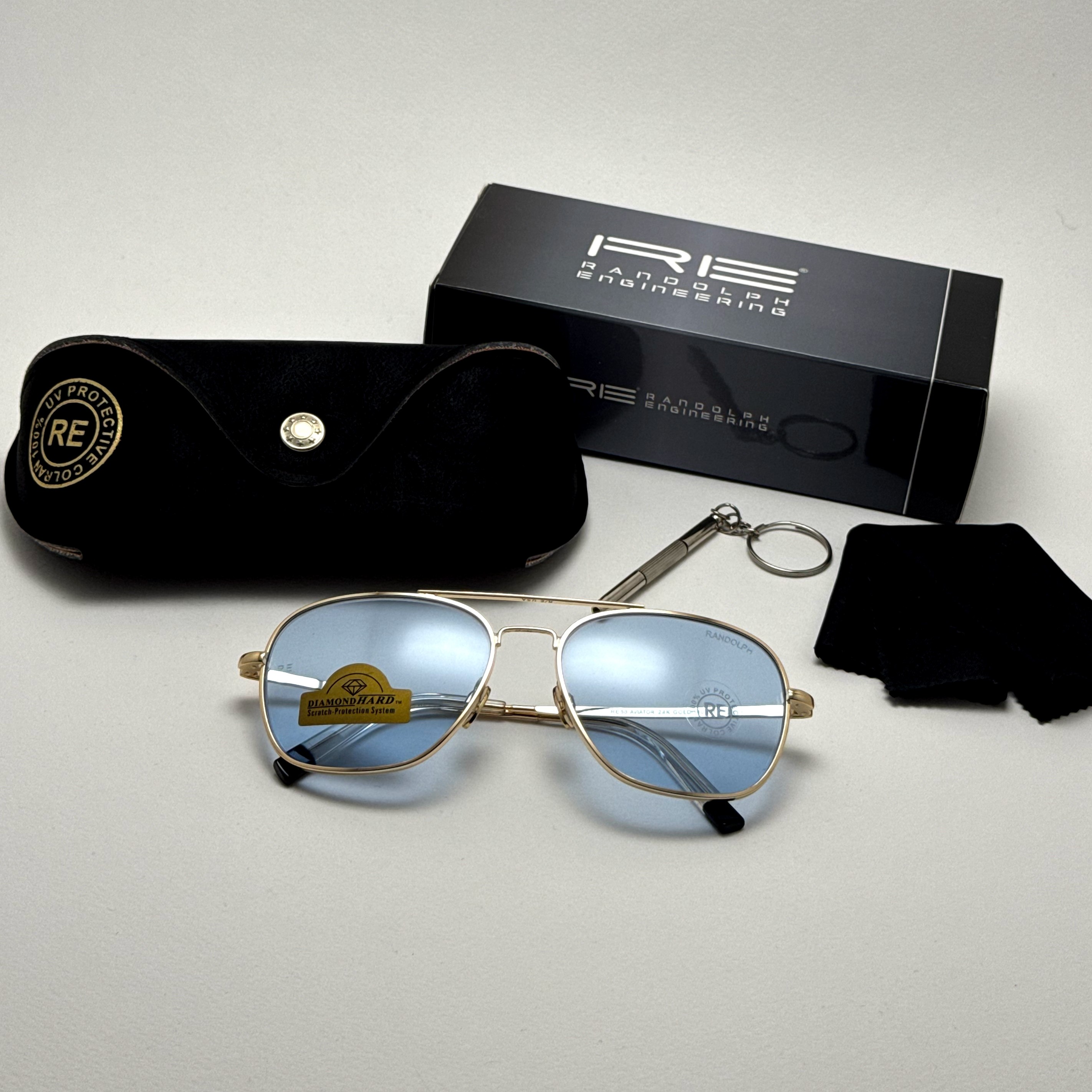عینک آفتابی خلبانی رندولف شیشه سنگ آبی آسمانی طلایی فول پک RANDOLPH AVIATOR  RE 58 24K GOLD