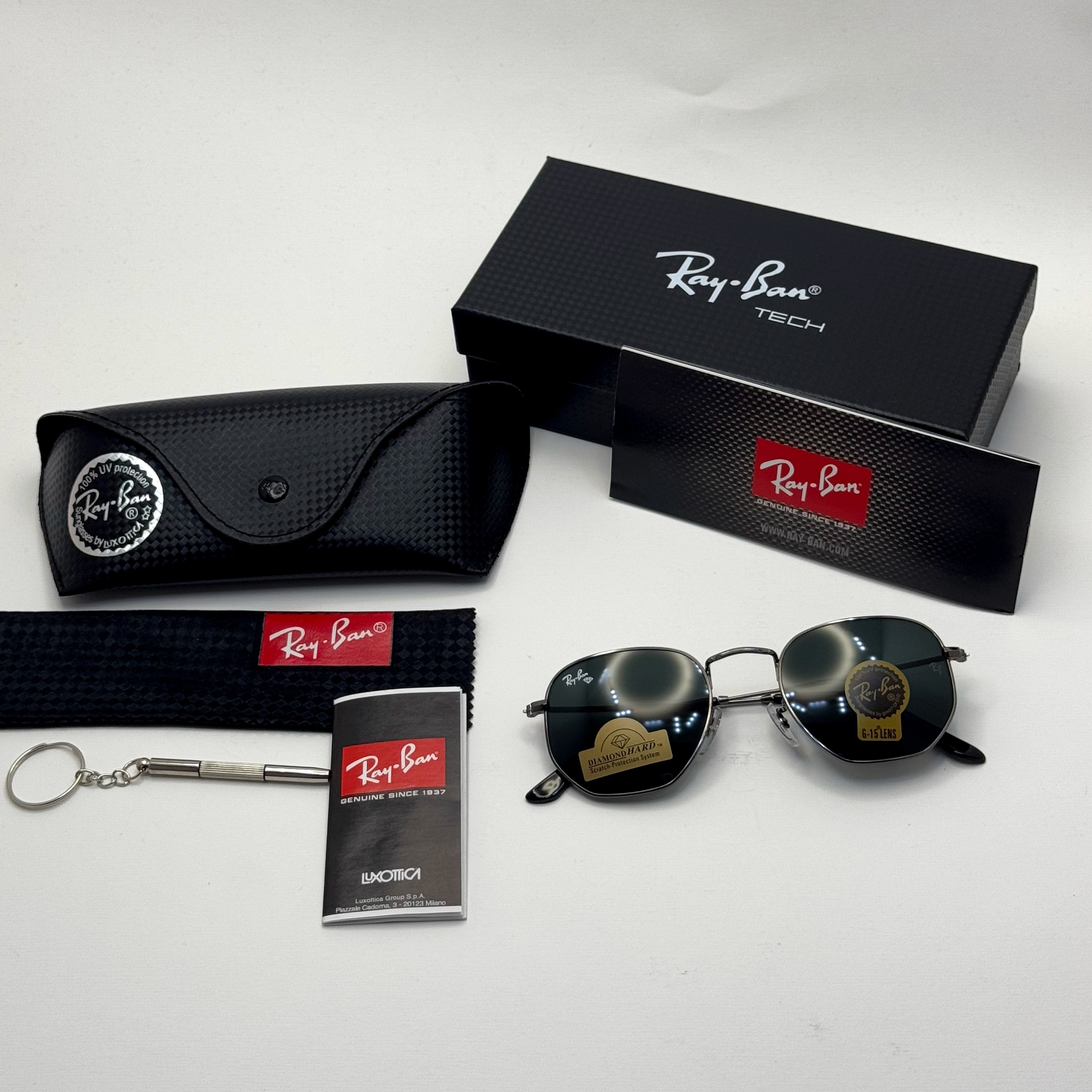 عینک ریبن هگزونال شیشه سنگ فریم نوک مدادی عدسی مشکی به همراه پک کامل ریبن کد Rayban RB 3548
