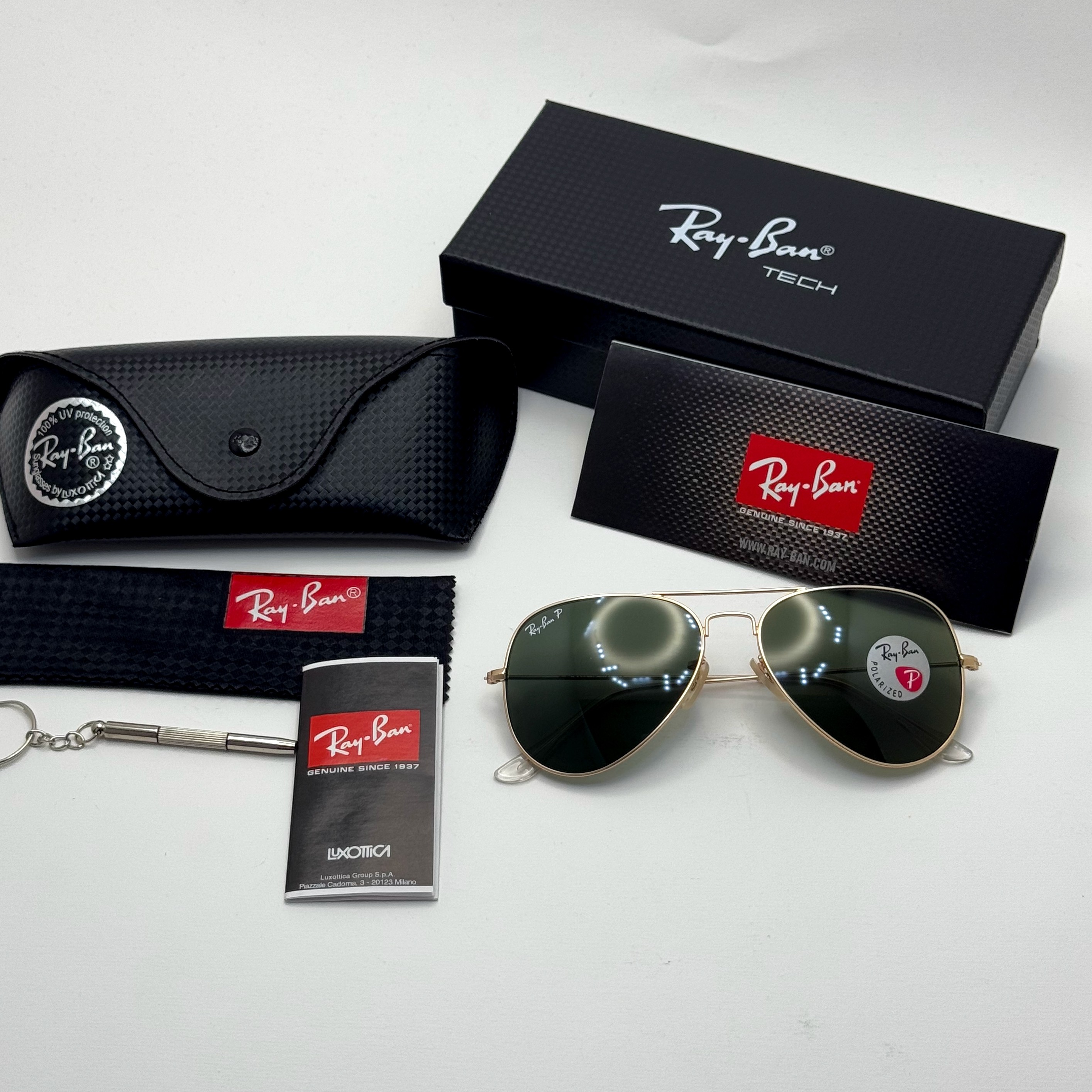 عینک ریبن خلبانی شیشه سنگ پلاریزه سبز با فریم طلایی به همراه پک کامل ریبن کد Rayban RB 3026