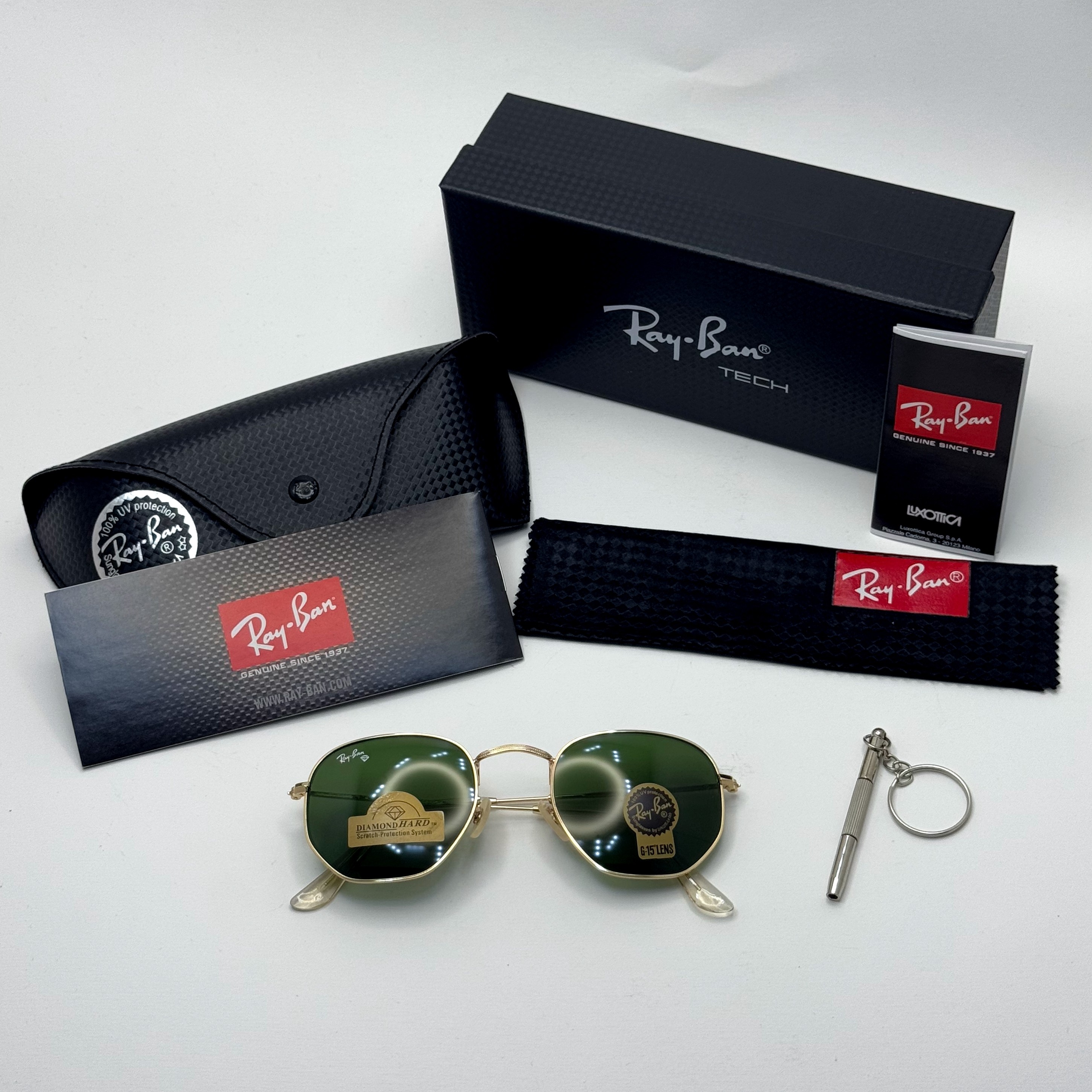 عینک ریبن هگزونال شیشه سنگ سیز فریم طلایی به همراه پک کامل ریبن کد Rayban RB 3548
