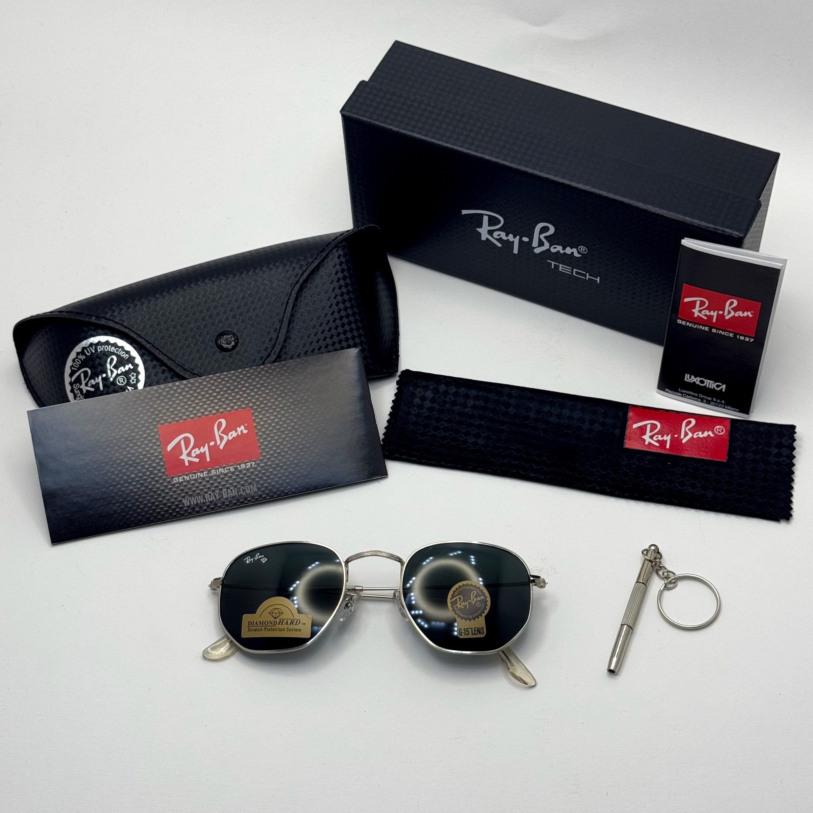 عینک ریبن هگزونال شیشه سنگ مشکی فریم نقره ای به همراه پک کامل ریبن کد Rayban RB 3548
