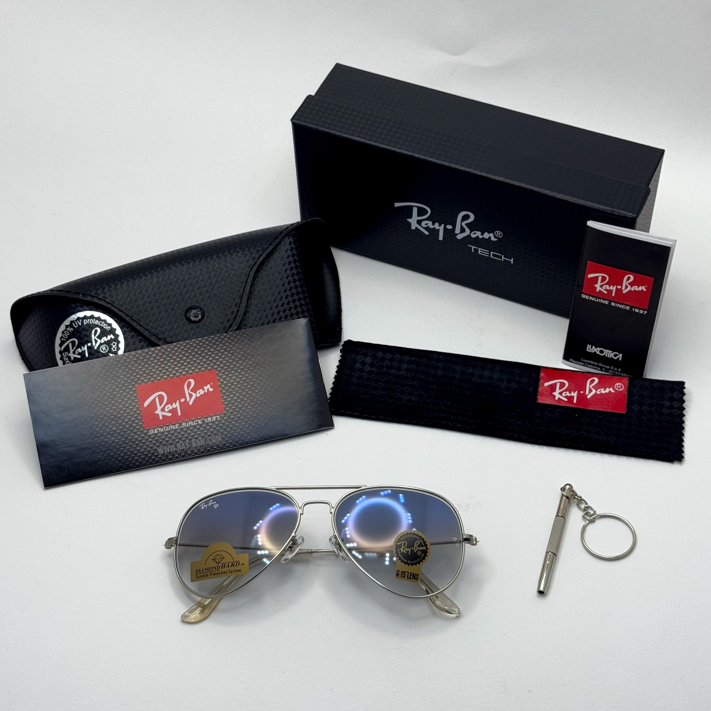 عینک ریبن خلبانی شیشه سنگ آبی هایلایت فریم نقره ای به همراه پک کامل ریبن Rayban RB 3025
