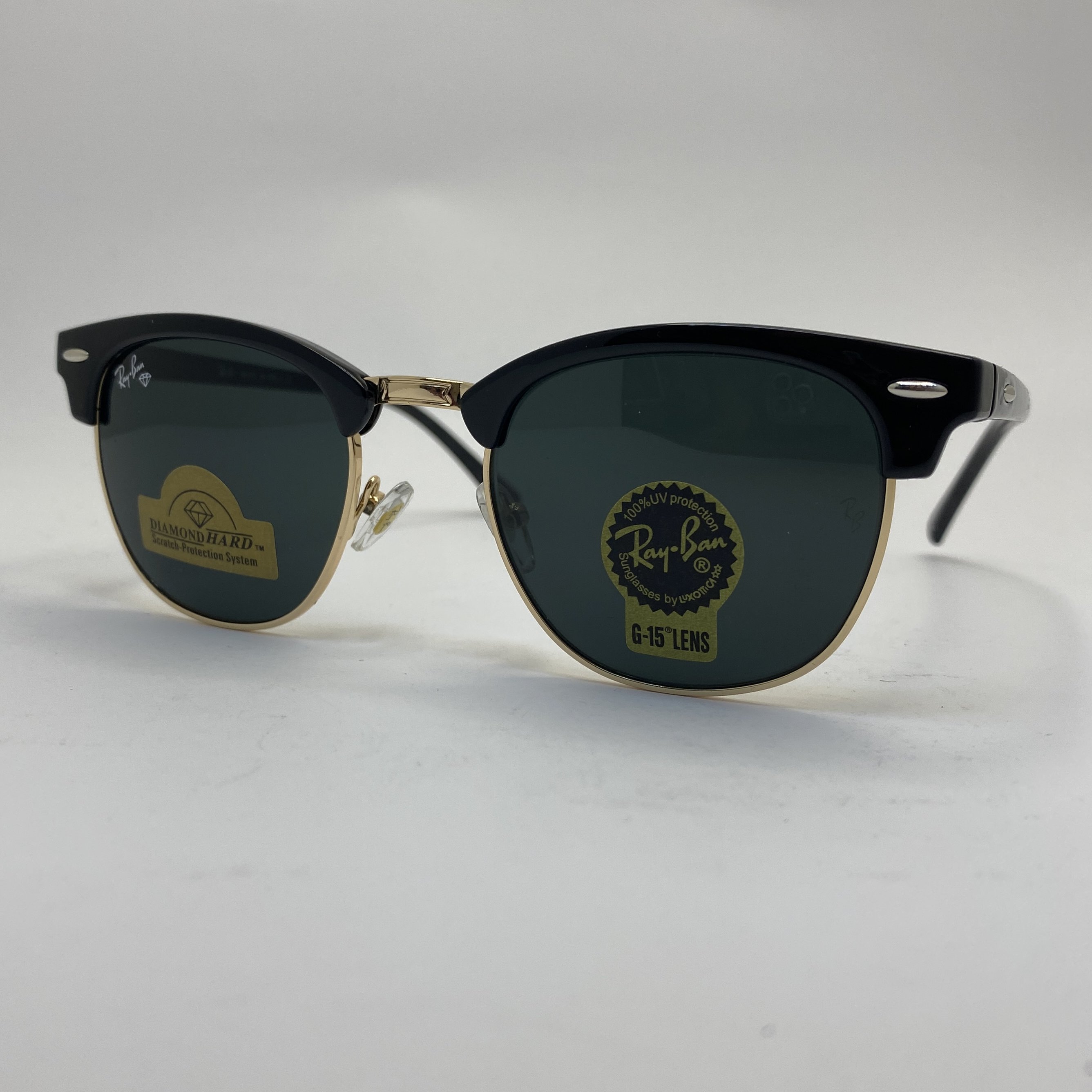 عینک ریبن rayban کلاب مستر شیشه سنگ مشکی طلایی RB 3016 با پک کامل اورجینال ریبن (جعبه،کیف،دستمال نانو،شناسنامه،کاتالوگ)