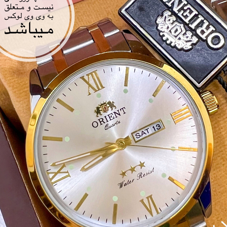 ساعت مردانه برند اورینت لوکس دو تقویمه با فول پک باکس استیل رنگ ثابت با تقویم فارسی و انگلیسی کیفیت عالی ORIENT