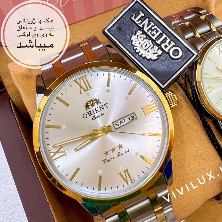 ساعت مردانه برند اورینت لوکس دو تقویمه با فول پک باکس استیل رنگ ثابت با تقویم فارسی و انگلیسی کیفیت عالی ORIENT
