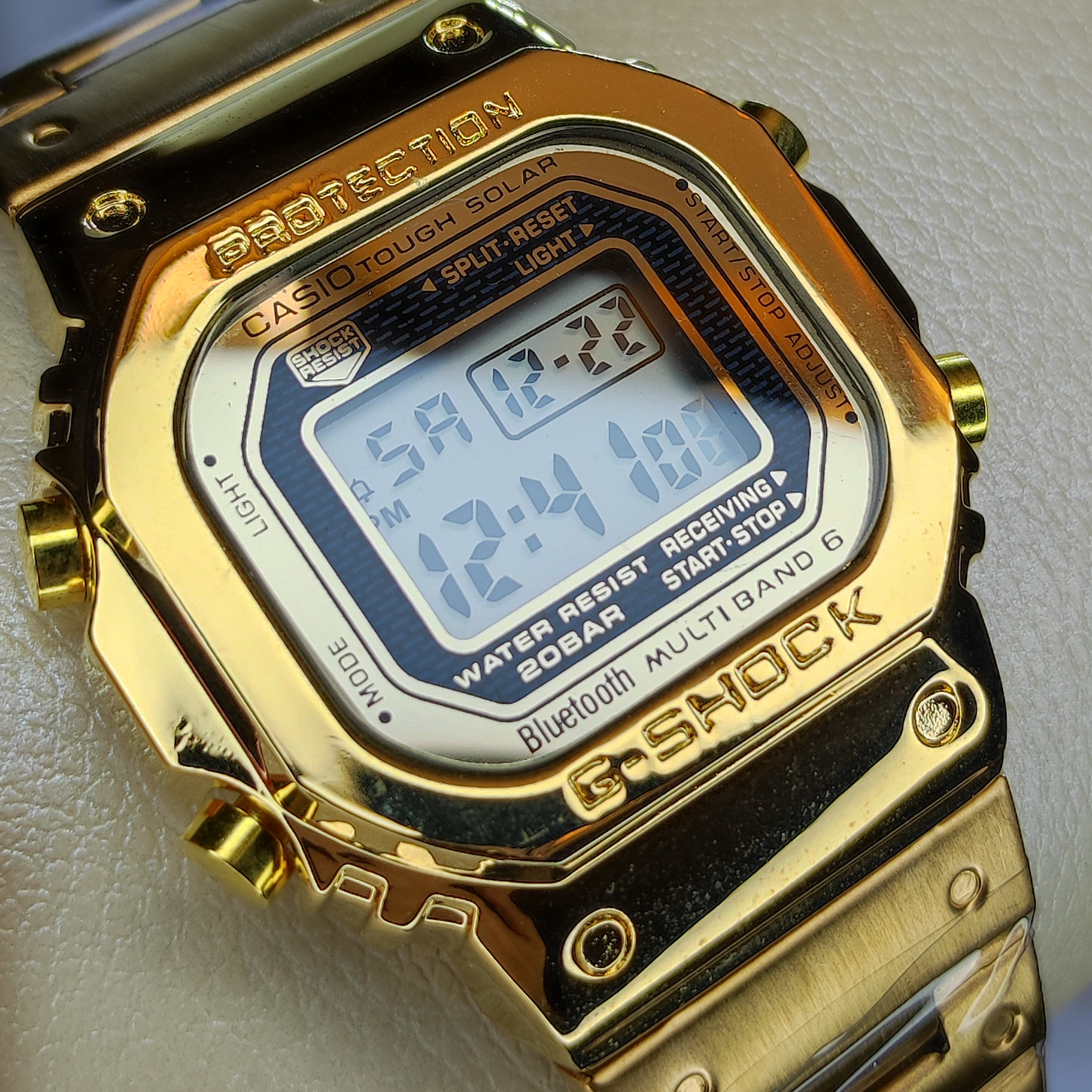 کاسیو جیشاک تمام فلزی CASIO G SHOCK 3459 دارای رنگبندی مشکی و طلایی و رزگلد مسی