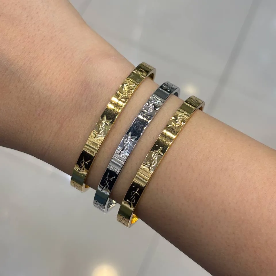 دستبند بنگل طرح YSL طلایی و نقره ای آبکاری درجه یک نقره و رادیوم رنگ ثابت کد zgy (پس کرایه)