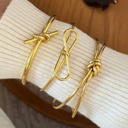 دستبند بنگل زنانه طرح گره و گره پاپیونی فری سایز freesize رنگ ثابت با کیفیت بالا کد zmc (پس کرایه)