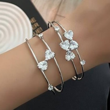 دستبند بنگل زنانه طرح جواهری و پاپیونی و قلب فری سایز freesize رنگ ثابت با کیفیت بالا کد zmc (پس کرایه)