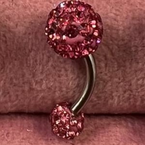 پیرسینگ ناف نقطه اتصال به بدن استیل طرح نگین سواروسکی رنگ ثابت و ضد حساسیت کد sf (پس کرایه)