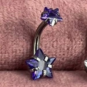 پیرسینگ ناف نقطه اتصال به بدن استیل طرح نگین ستاره تنوع طرح و رنگ رنگ ثابت و ضد حساسیت کد sf (پس کرایه)