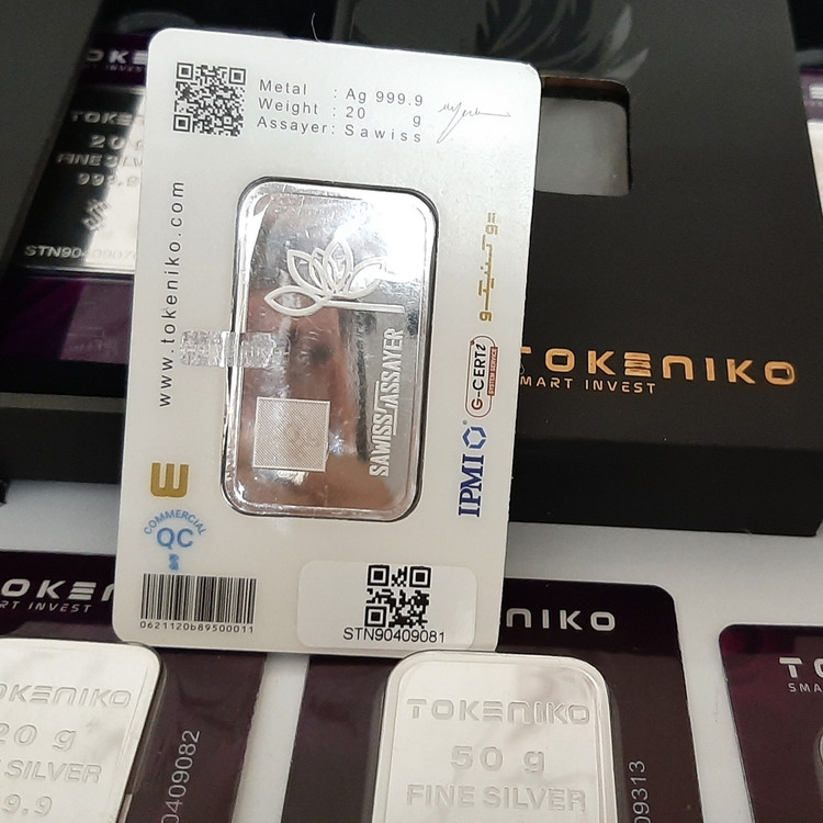 شمش نقره 20 گرمی مارک توکنیکو عیار 999/9 حک خورده و کاملا استاندارد ورق بزنید لطفا