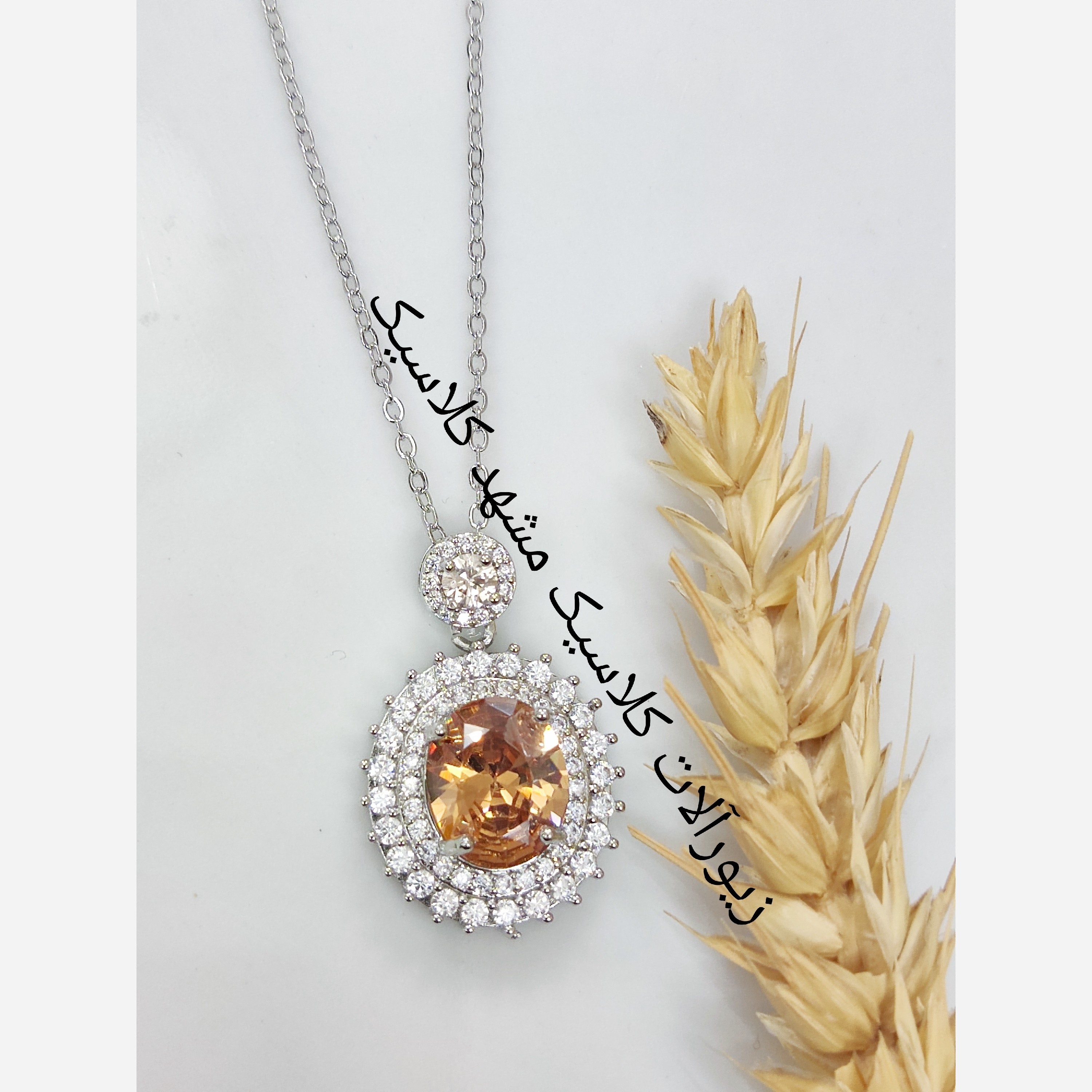 گردنبند استیل نگین طرح سیترین بیضی دور نگین نقره ای