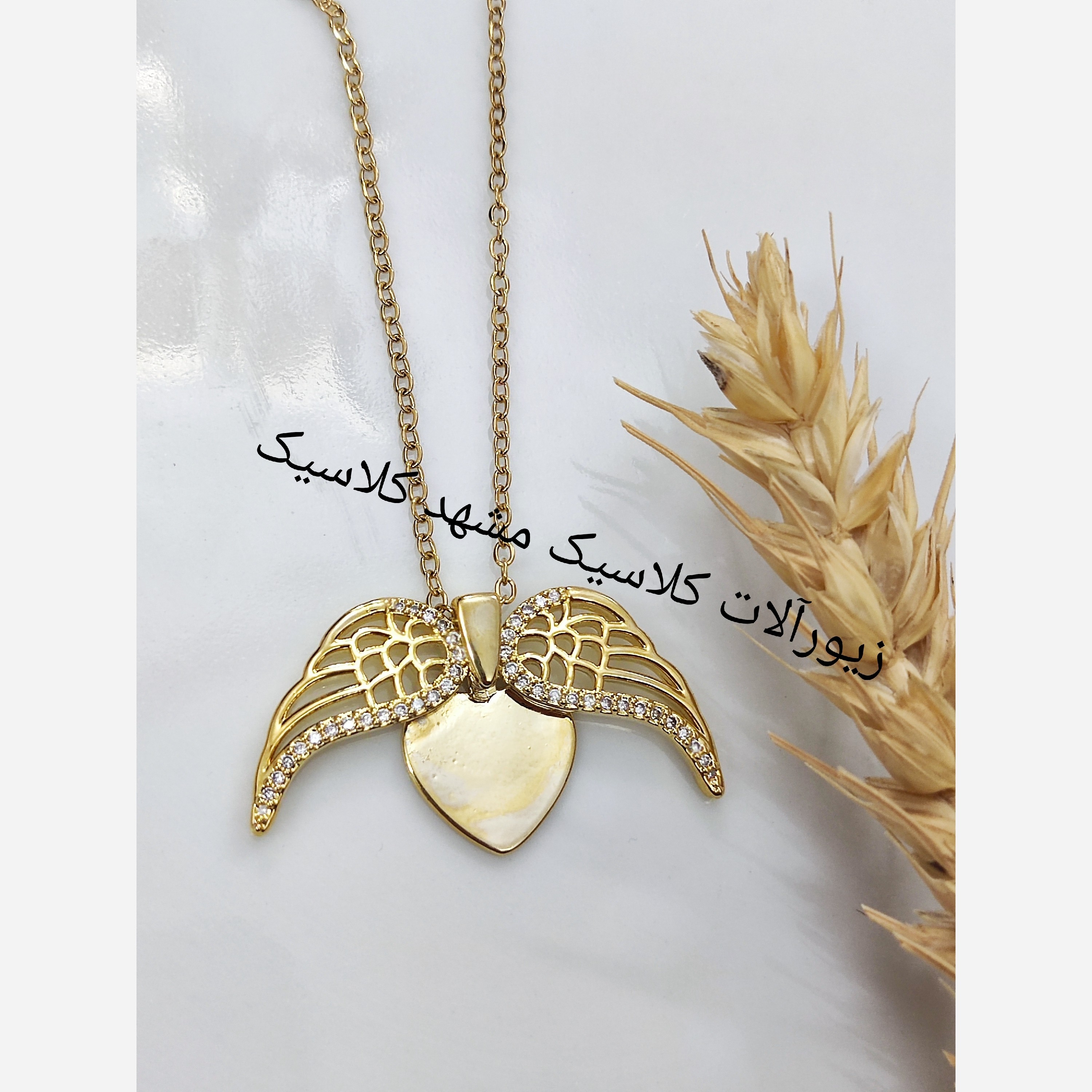 گردنبند استیل قلب بال دار مخصوص حکاکی