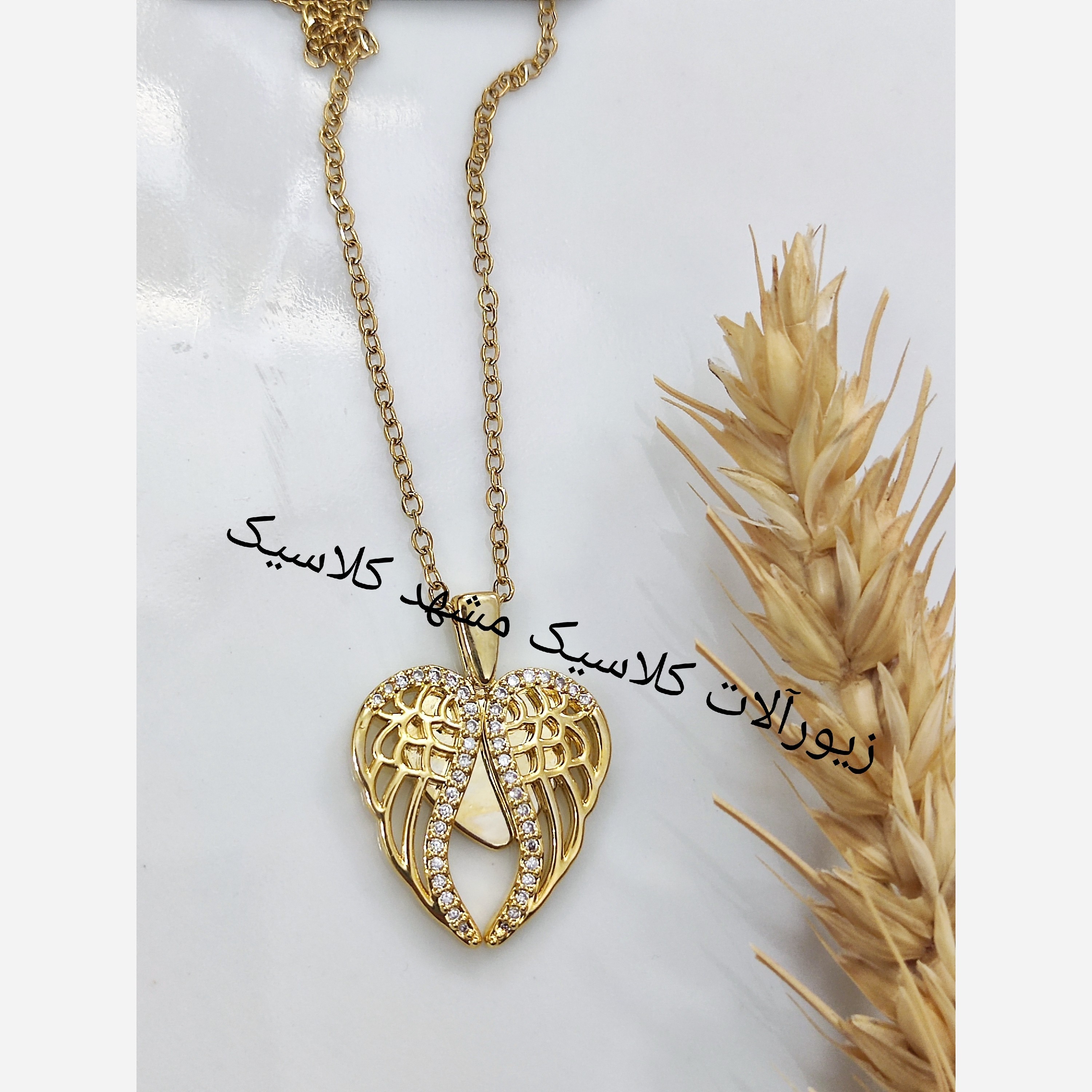 گردنبند استیل قلب بال دار مخصوص حکاکی