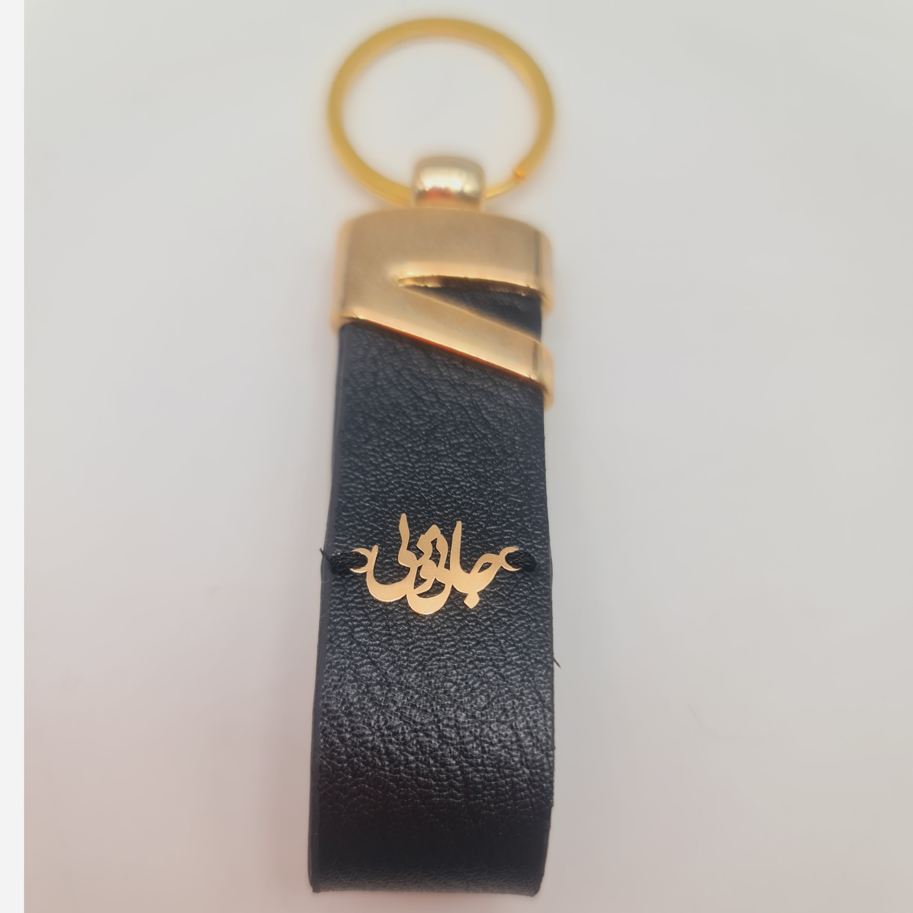جاسوییچی چرم با پلاک طلا طرح جانی و دلی