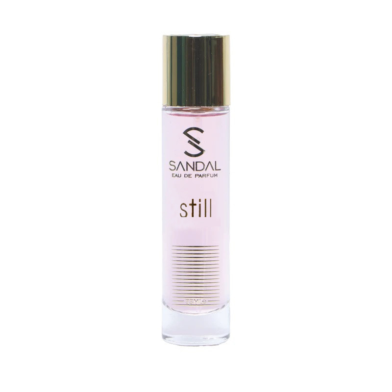 عطر جیبی زنانه صندل مدل still jennifer lopez با رایحه گلی و تند حجم 33 میلیلیتر