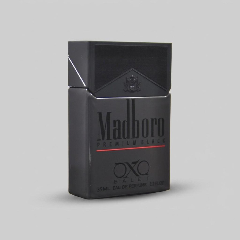 عطر جیبی اکس بالت مدل madboro premium black با رایحه گرم حجم 35 میلی‌لیتر