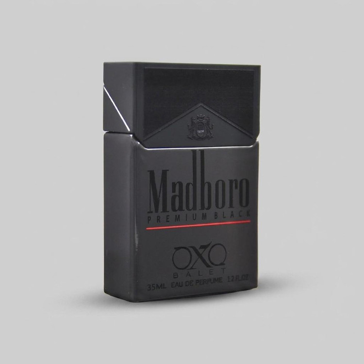 عطر جیبی اکس بالت مدل madboro premium black با رایحه گرم حجم 35 میلیلیتر