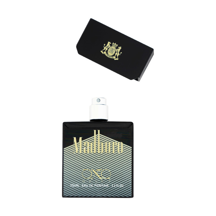 عطر جیبی اکس بالت مدل madboro touch gold با رایحه گرم حجم 35 میلیلیتر