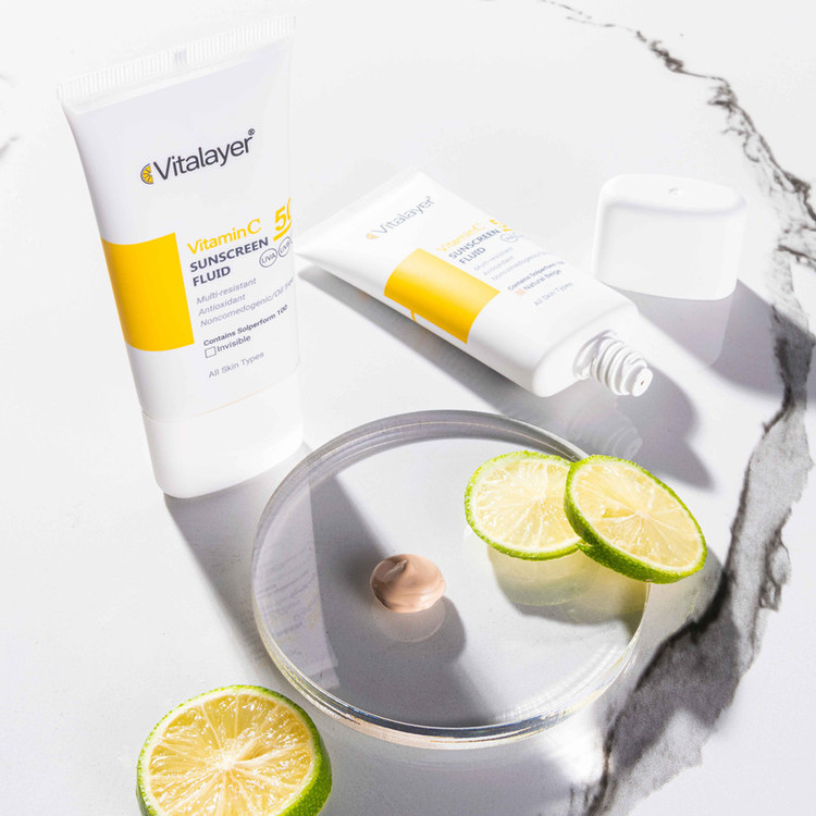 فلوئید ضدآفتاب بیرنگ ویتالیر SPF50 مدل Vitamin C مناسب انواع پوست، حجم 50 میلیلیتر