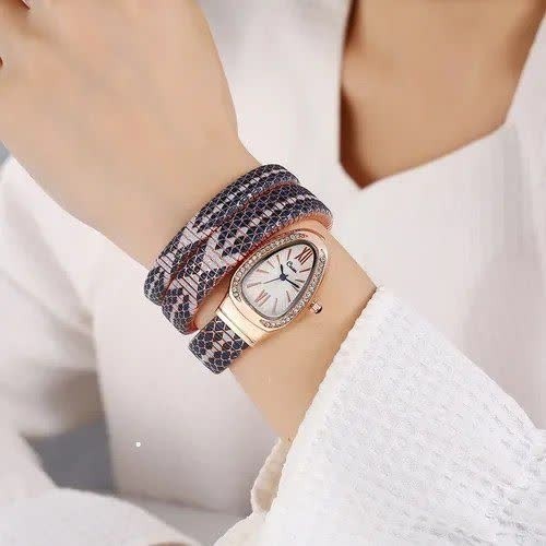 ساعت مچی عقربه ای زنانه ماری دستبندی فنری رنگ ثابت صفحه سفید