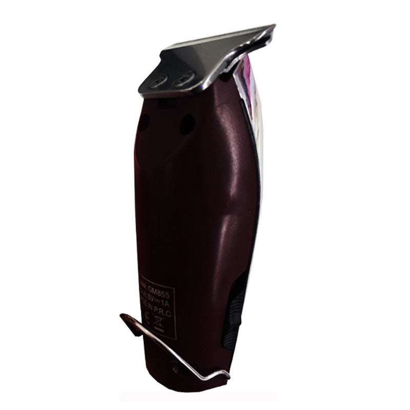 ماشین اصلاح موی سر و صورت جیمی مدل GM 855 با تیغه استیل ضد زنگ، باتری لیتیوم یون، دو سرعت موتور قابل تنظیم، منبع تغذیه برق و باتری قابل شارژ، همراه با 3 عدد شانه متحرک و طراحی ارگونومیک