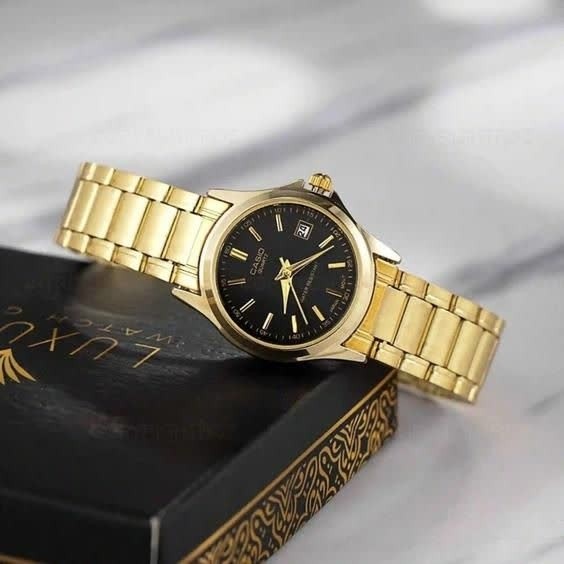 ساعت مچی زنانه کاسیو CASIO موتور ژاپنی بند طلایی صفحه مشکی + جعبه