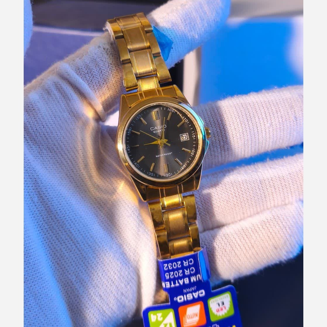 ساعت مچی زنانه کاسیو CASIO موتور ژاپنی بند طلایی صفحه مشکی + جعبه