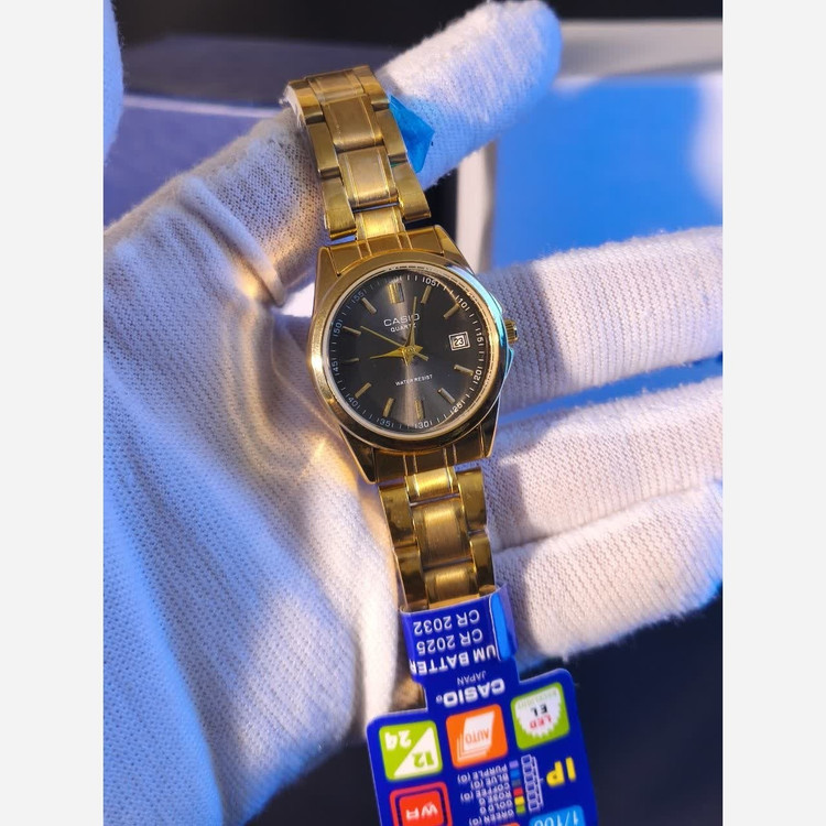 ساعت مچی زنانه کاسیو CASIO موتور ژاپنی بند طلایی صفحه مشکی + جعبه