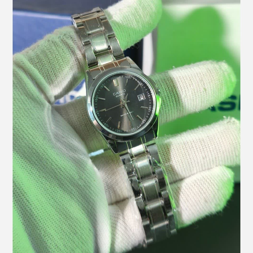 ساعت مچی زنانه کاسیو CASIO موتور ژاپنی بند نقره ای صفحه مشکی+ جعبه