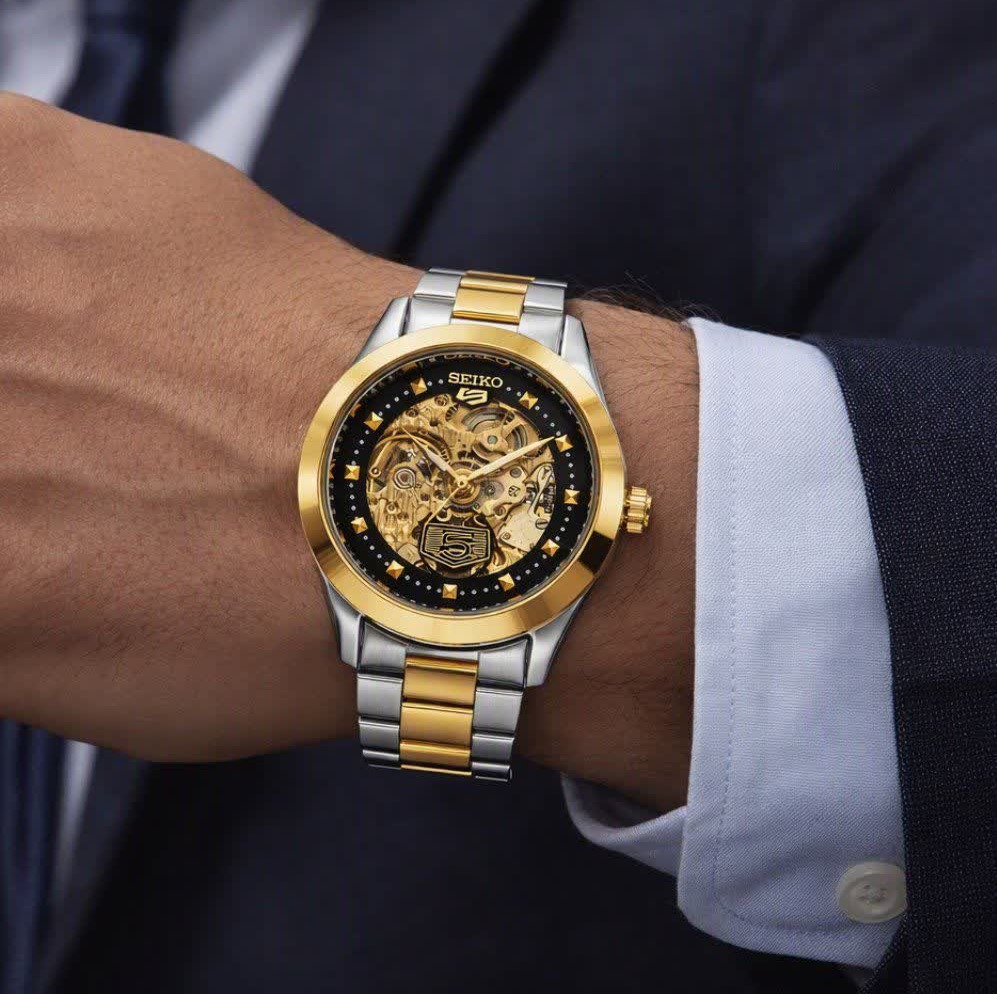 ساعت مچی اتوماتیک مردانه سیکو پنج SEIKO 5 نقره ای طلایی صفحه مشکی